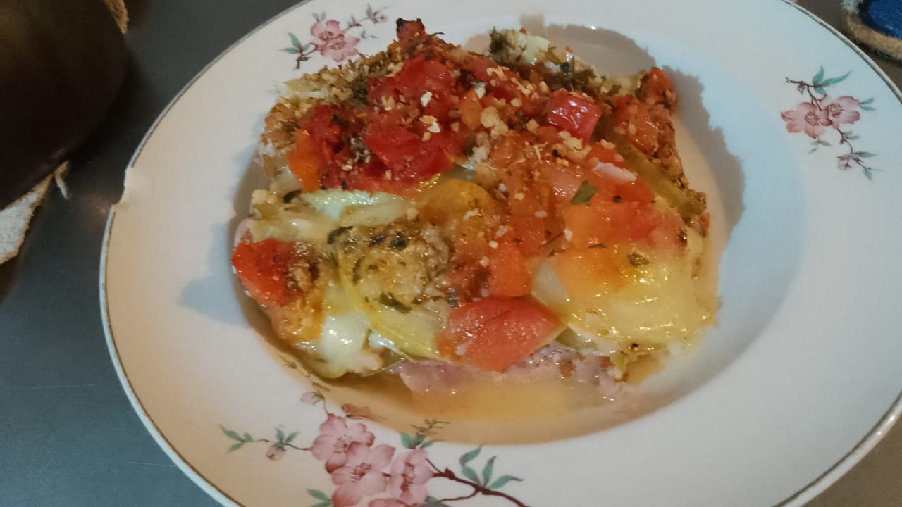 Berenjenas con tomates, jamón y queso